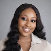 Alexia Lewin smiling as Executive Assistant at NGNG Enterprises